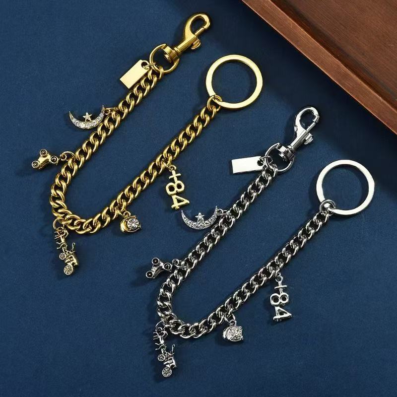 bag charm designer Motif Chain Bag Charm handbag charm carriage cherry luxury keychain bag Accessory Circle buckle Long chain Coa ach pendant quality alloy chain