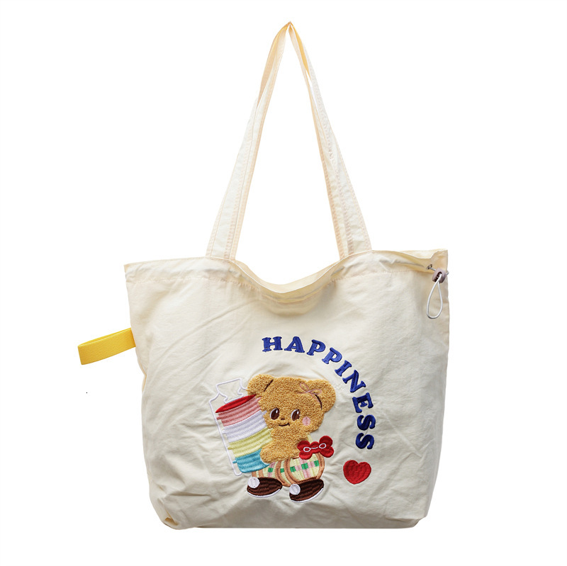 designer 2025 New Cartoon Canvas Bag Large Capacity Student Class Commuter Shoulder Bag Casual Versatile Handheld Tote Bag