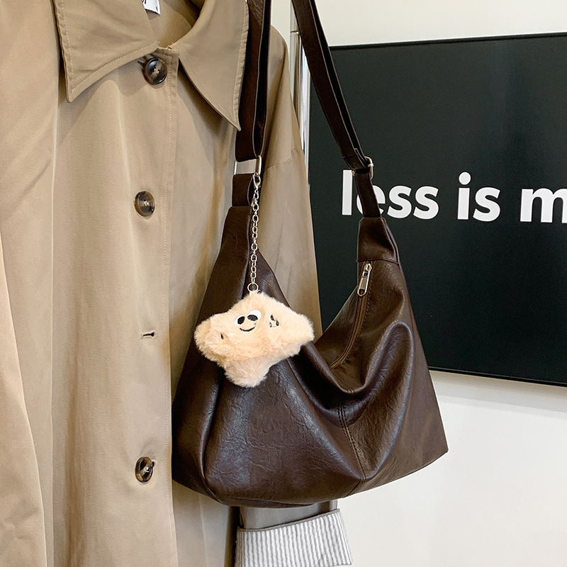 designer 2025 New Retro Solid Color Bag for Students, Fashionable Casual Shoulder and Crossbody Large Capacity Commuter Bag for Women