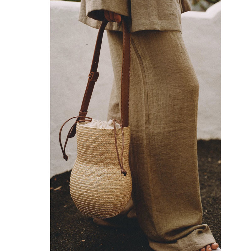 New Hulu One Shoulder Straw Bag Fashion Handheld Wheat Straw Hand woven Bag Resort Style Beach Bag Designer Multi functional Women's Bag