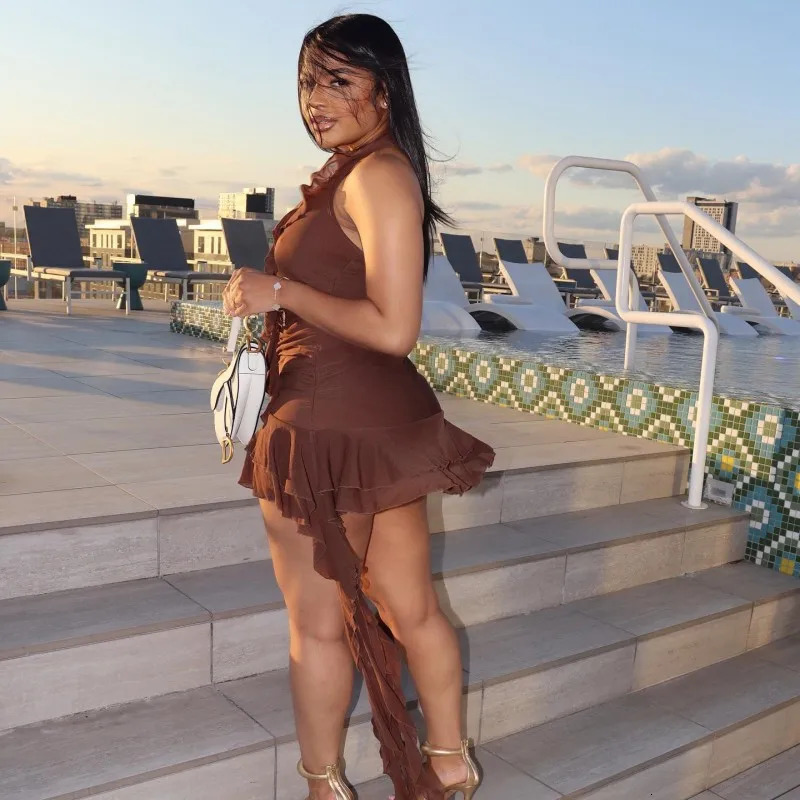 Summer solid color sleeveless low neck black fungus edge irregular hip hugging short dress 250604