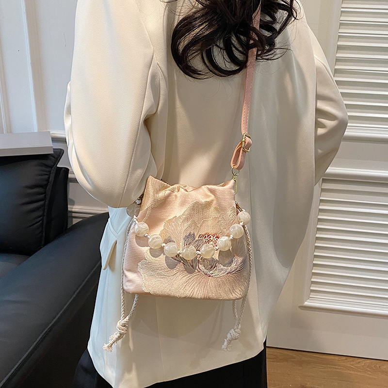 Free Shipping Designer Bag Fashionable New Black Gold Butterfly Crossbody Flower Texture Bucket Pearl Handheld Chinese Style Women's Bag