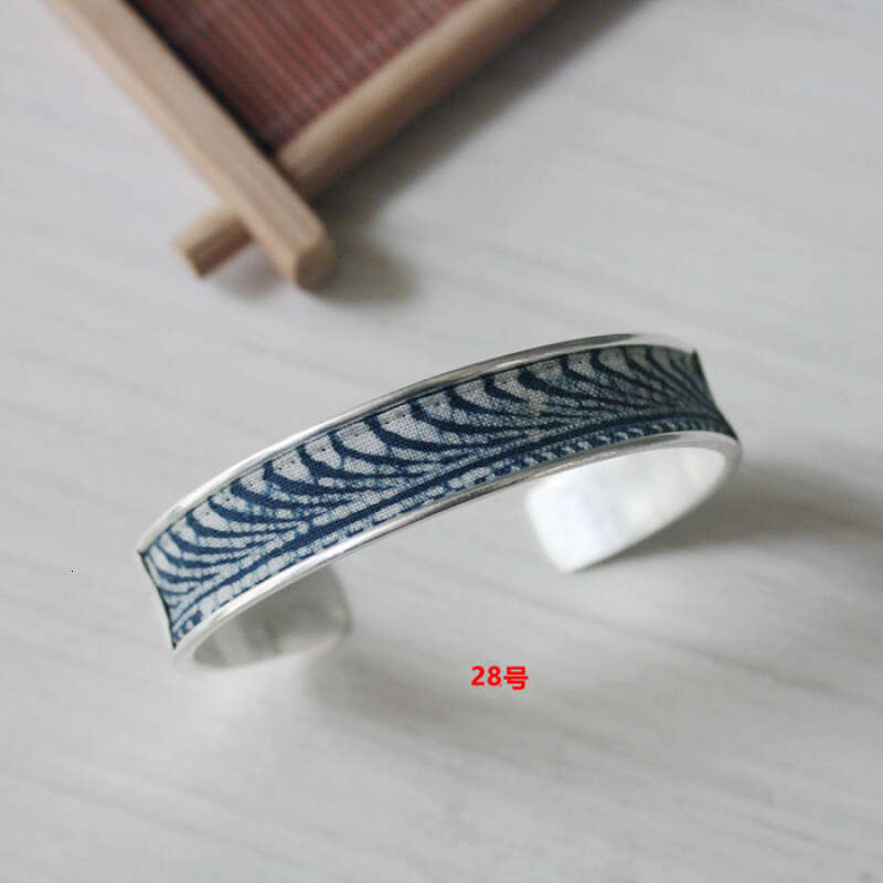 DHCollections Ancient Style Sier Wind Blue Old Couple Postage Bracelet Strip Text Wax Dyed Replica