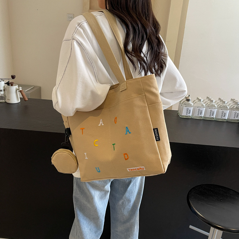 designer Large Capacity Canvas Bag for Women 2025 New Trendy Embroidered Letter Handbag Fresh Style Student Shoulder Tote Bag