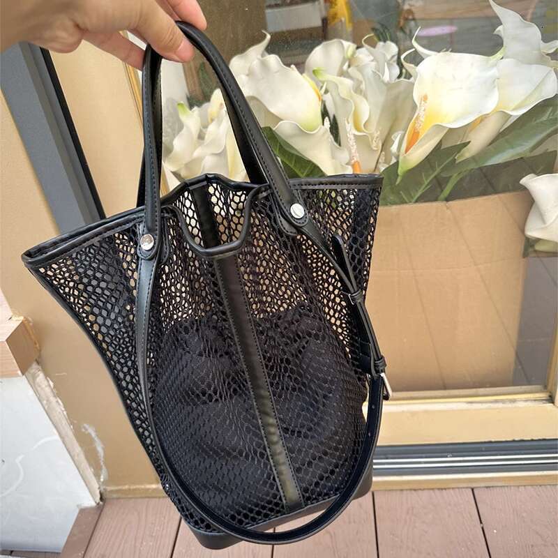 Brand Hand woven Large Capacity Vegetable Handbag Hollow Mesh Summer Beach Vacation Shopping Mother child Net Shoulder Bag