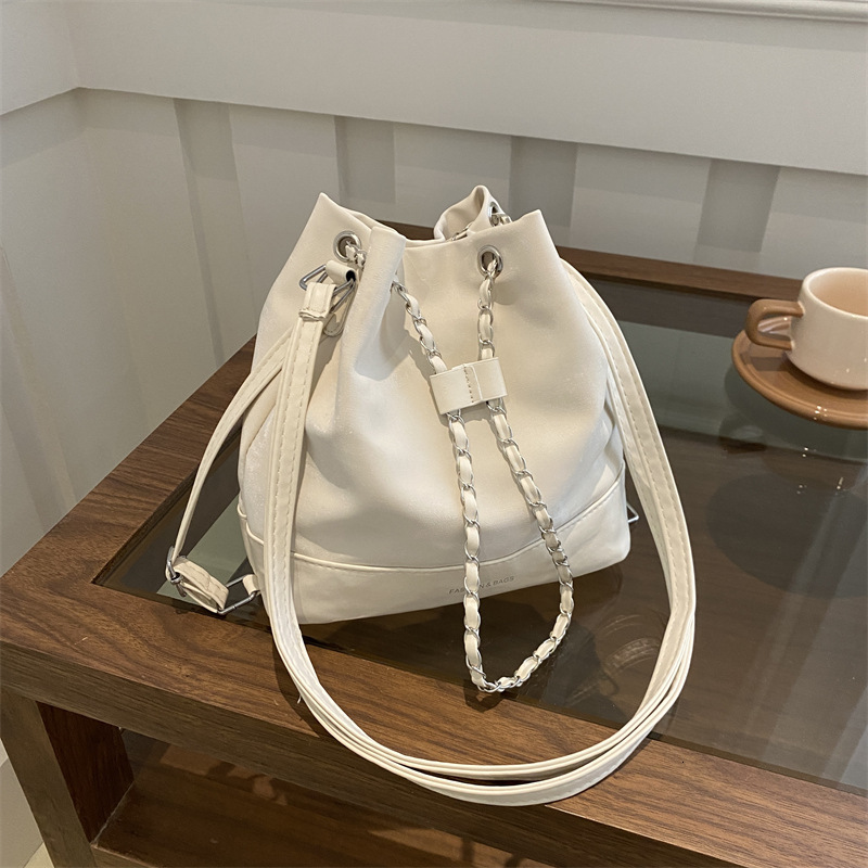 Women s bucket trend bag new trend niche design women s chain backpack designer fashionable slanted white backpack shoulder bag