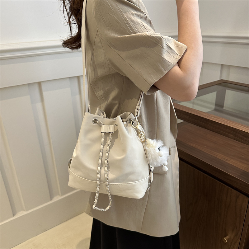 Women s bucket trend bag new trend niche design women s chain backpack designer fashionable slanted white backpack shoulder bag