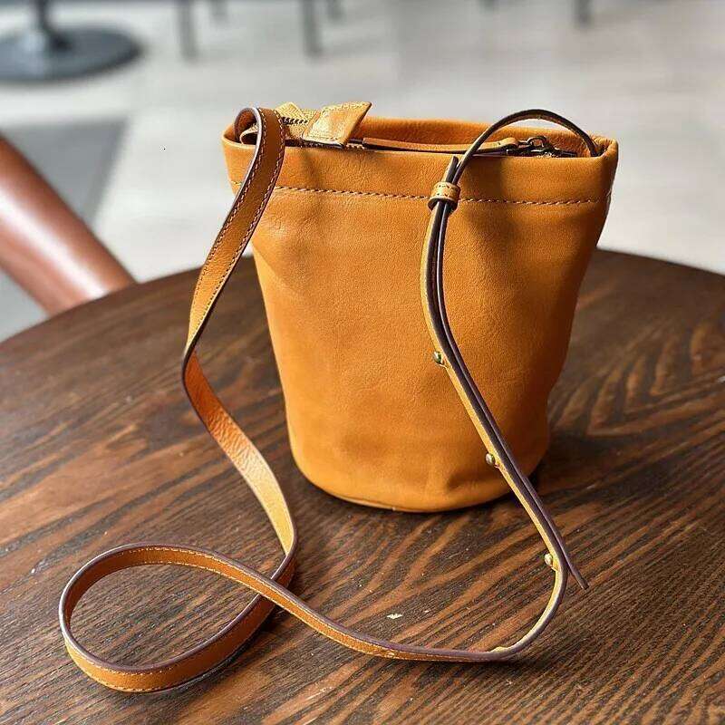 Johnature Casual Women's Mini Bag 2025 New Simple Solid Color Genuine Leather Versatile Small Bucket Shoulder & Crossbody Bags 2025/06/05