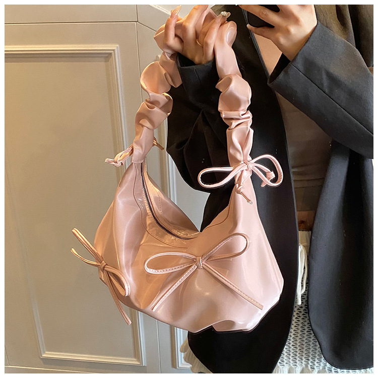 Wrinkled shoulder bag, new bow crossbody bag, simple commuting armpit cloud bag, designer women's large capacity handbag