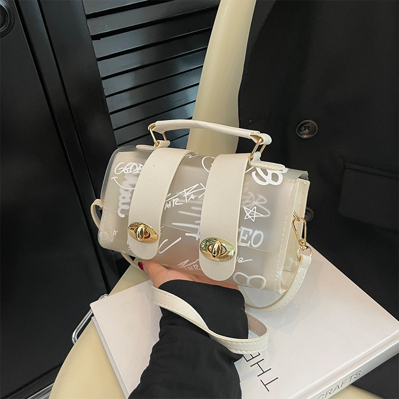 Top brand high-quality new free designer bag transparent jelly pouch 2025 new PVC printed graffiti Cambridge bag beach crossbody bag brand new free de