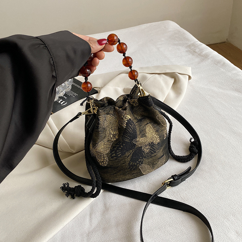 Free Shipping Designer Bag Fashionable New Black Gold Butterfly Crossbody Flower Texture Bucket Pearl Handheld Chinese Style Women's Bag