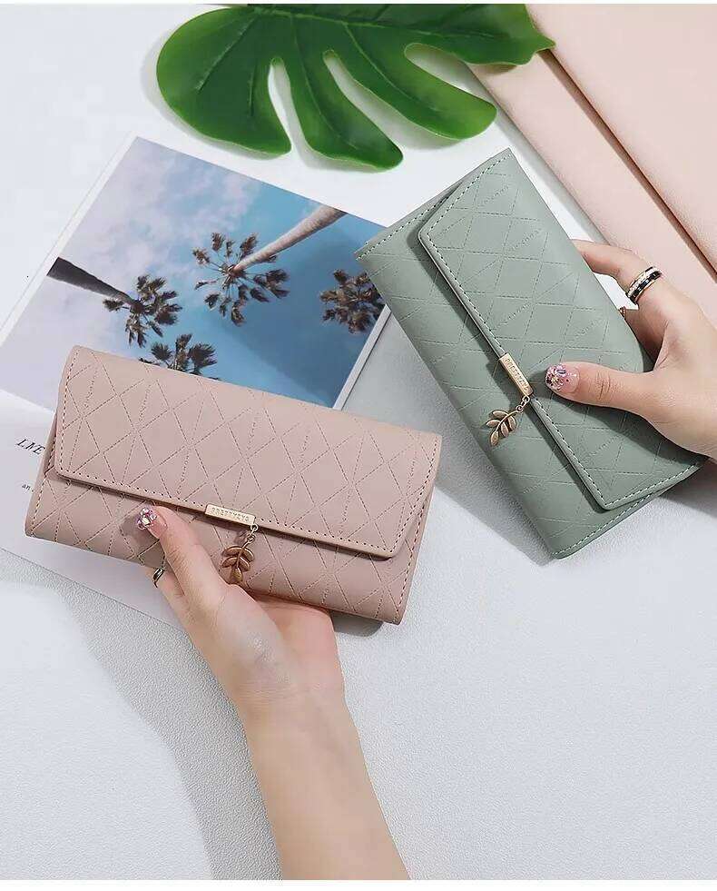 summer new Korean version of high texture PU Dia lattice personality leaf pendant three fold bag multi-card can be MASA