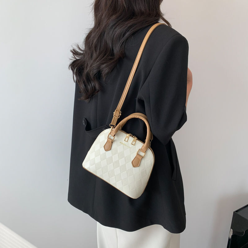 2025 Spring and Summer New Women's Bag New French Niche Design Texture Multi functional Women's Handbag New Elegant and Simple Women's 