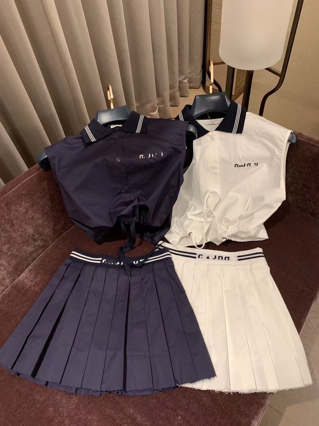 Summer new niche fashionable embroidered letter ribbon short vest sleeveless top two-piece set pleated half skirt short skirt for women