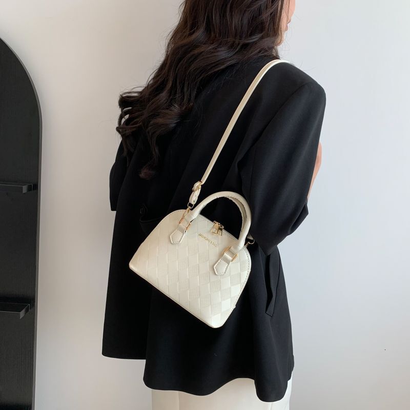 2025 Spring and Summer New Women's Bag New French Niche Design Texture Multi functional Women's Handbag New Elegant and Simple Women's 