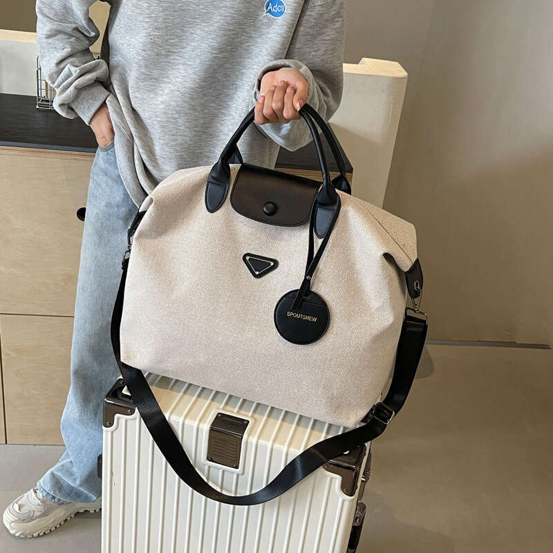 2025 bag New Short-Distance Large Capacity Gym for Women High-End Lightweight Duffel Travel Bag Outdoor Handbag Designer Pack