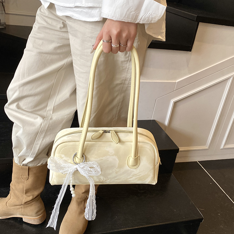 designer Niche Texture Fashion Single Shoulder Underarm Bag for Women 2025 New Spring Summer Large Capacity Commuter Handbag Bowling Ball Bag