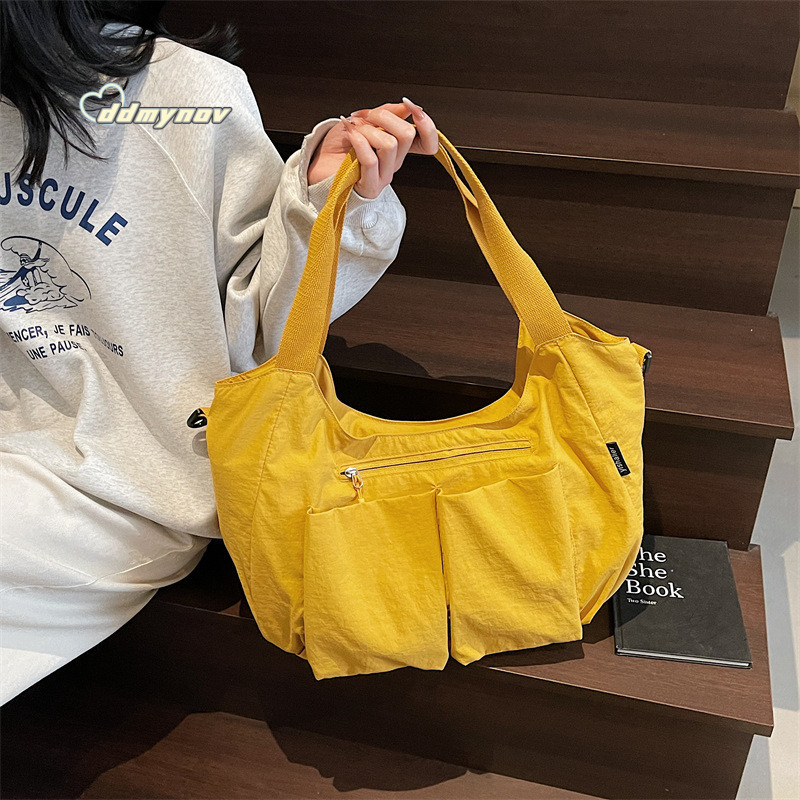 Hot Selling Canvas Women's 2025 New Simple Fashion Large Capacity Shoulder Tote Dumpling Bag ddmynov