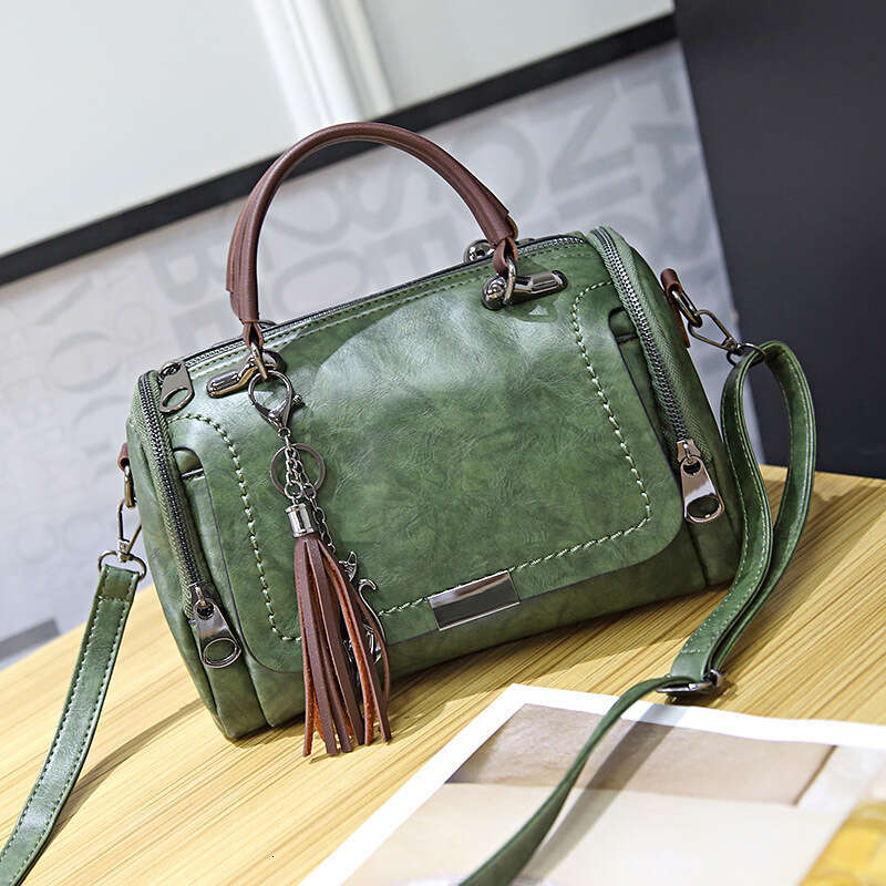 Spring New Korean Style Easy to Match Single Shoulder Crossbody Boston Pillow Women s Handheld Tassel Bag