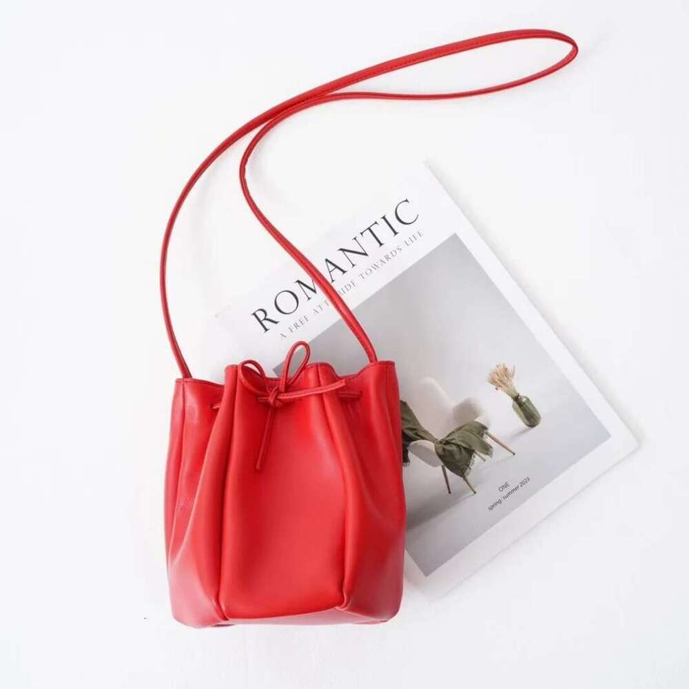 Sheepskin Drawstring Bucket 2025 New Spring Niche Design Genuine Leather Shoulder Soft Women's Mini Yellow Crossbody Bag