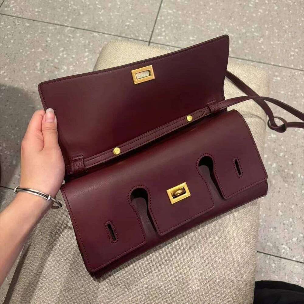 Genuine leather handbag 2025 new niche design lock small square vintage motorcycle style cowhide one-shoulder crossbody bag