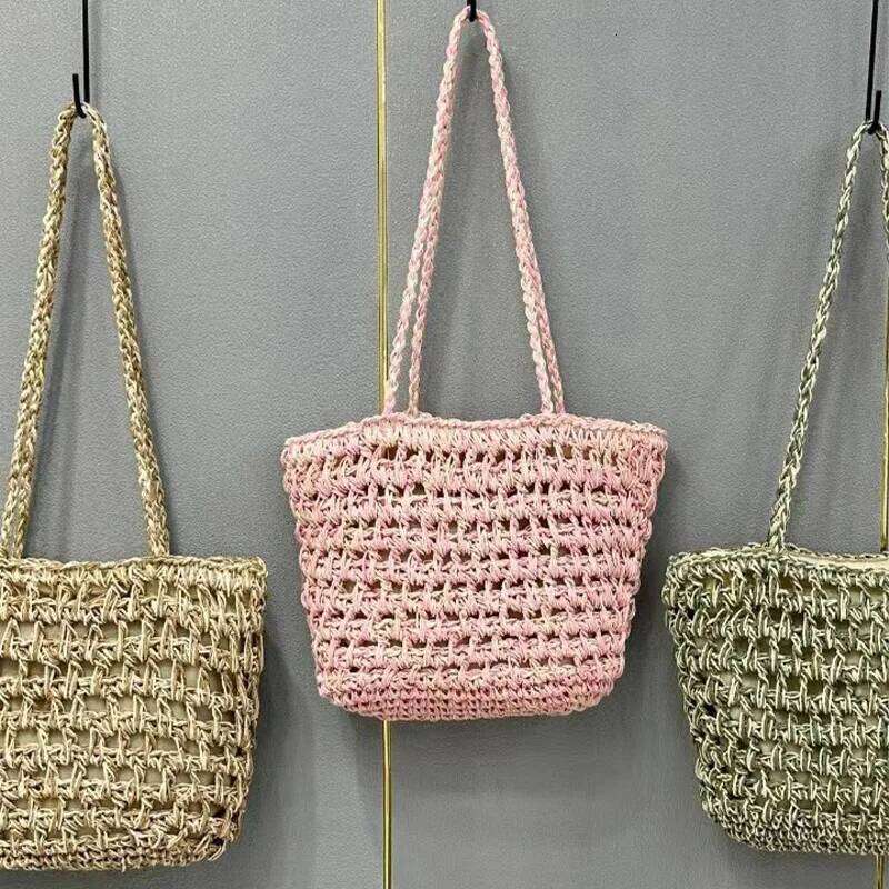 2025 Summer New Women's Big Straw Fashion Beach Handbag Hollow Design Braided Exquisite Metal Chain Bag