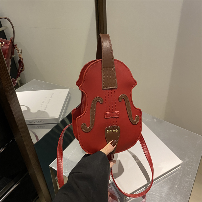 designer 2025 New Women's Backpack Bag Autumn Winter Casual Fashion Handbag Shoulder Bag Simple Crossbody Violin Bag