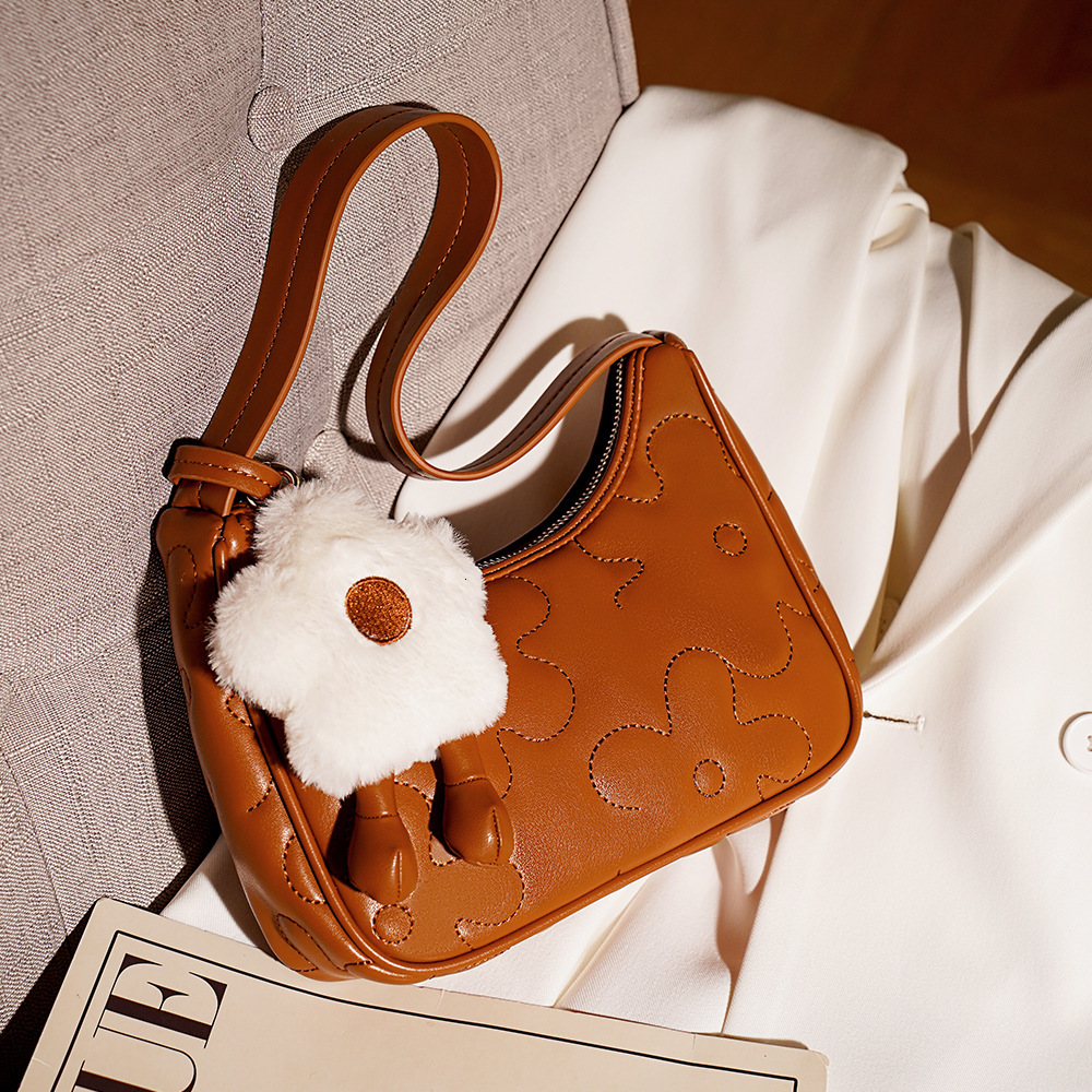 Free Shipping Designer Women's Bag 2025 New Simple One Shoulder Armpit Bag Summer Niche High-end French Stick Bag Handbag