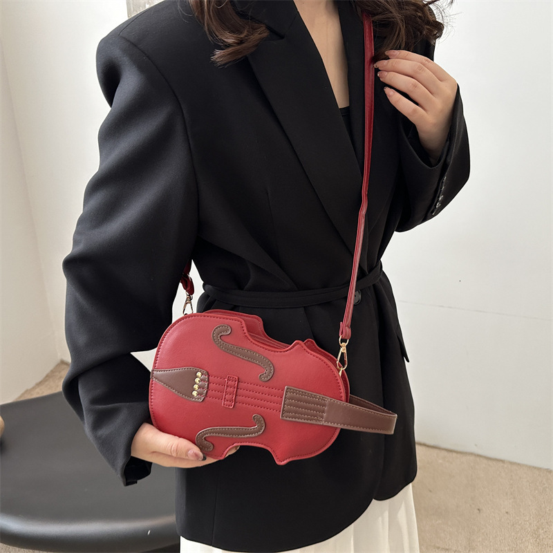 designer 2025 New Women's Backpack Bag Autumn Winter Casual Fashion Handbag Shoulder Bag Simple Crossbody Violin Bag