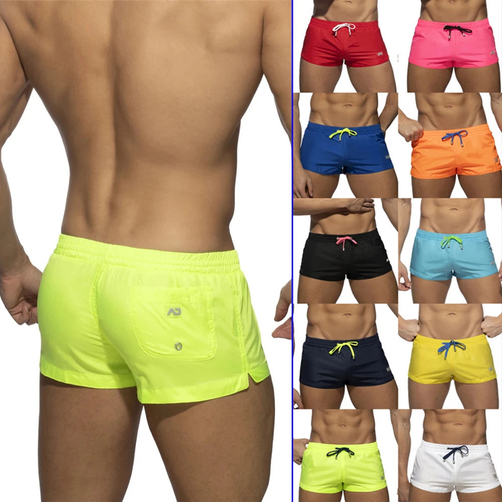 European And American Swimming Trunks Mens Solid Color Quick-Drying Low Waist Sexy Beach Pants Mens Swimming Sports Shorts 250530