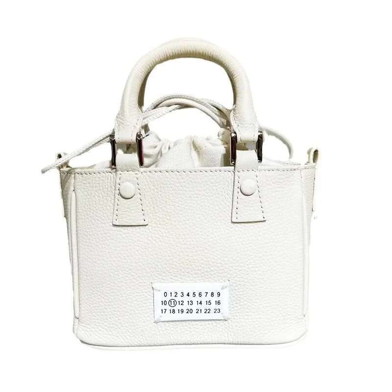 Hot Selling Fashionable Versatile Niche Design Women's Camera Single Shoulder Slant Cross Handbag Genuine Leather Food Basket Bucket Bag Designer