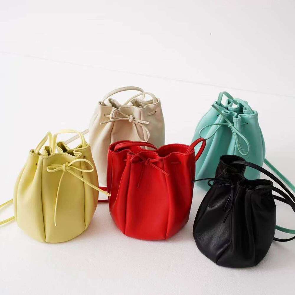 Sheepskin Drawstring Bucket 2025 New Spring Niche Design Genuine Leather Shoulder Soft Women's Mini Yellow Crossbody Bag