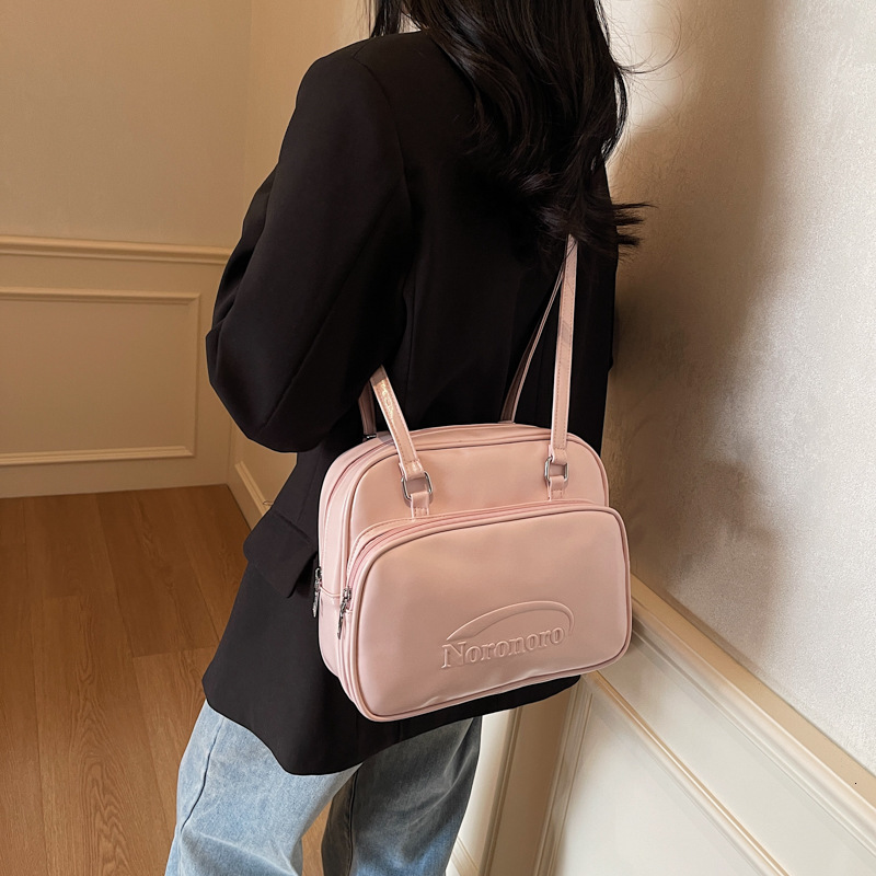 designer Minimalist Messenger Backpack for Women Spring Summer 2025 New Fashionable Handheld Briefcase Large Capacity Shoulder Bag