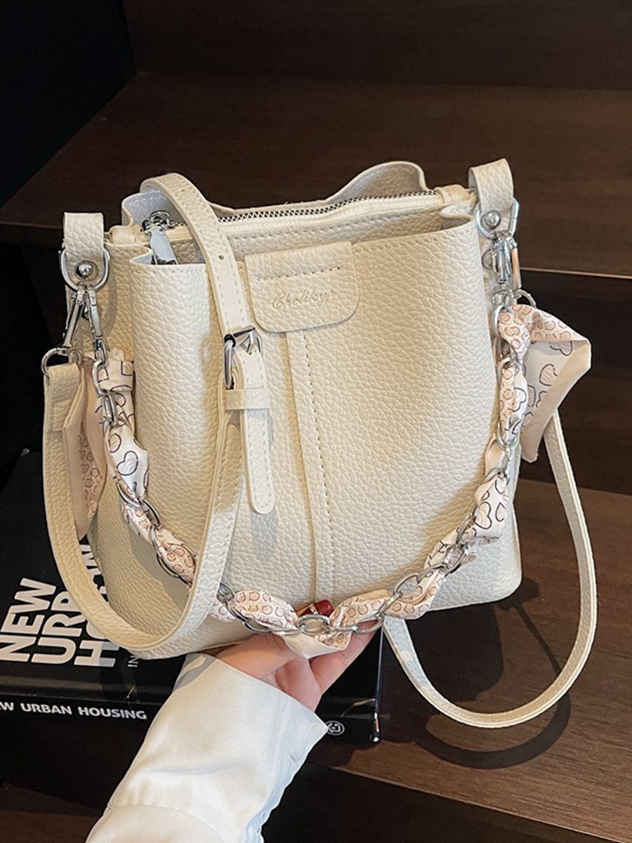 2025 New Spring Summer Women's Bag Fashion Women's Bag New Texture Single Shoulder Crossbody Bag Outdoor Handheld Bucket Bag Chain Bar Desig