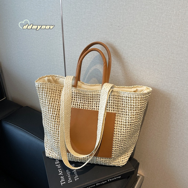 Foreign Trade Large Capacity Woven Straw for Women 2025 New Niche Fashion Single Shoulder Handbag Beach Tote Bag ddmynov