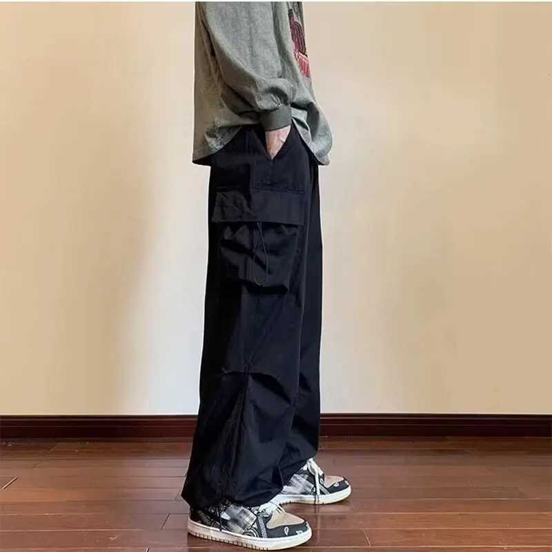 2025 New Mens Overalls Multi-Pocket American Hip-Hop Pants Mens Ins High Street Spring And Autumn Bunched Foot Assault Pants Z250605