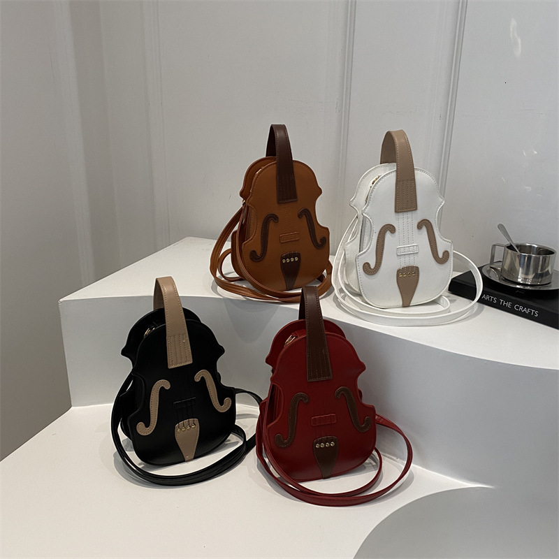 designer 2025 New Women's Backpack Bag Autumn Winter Casual Fashion Handbag Shoulder Bag Simple Crossbody Violin Bag