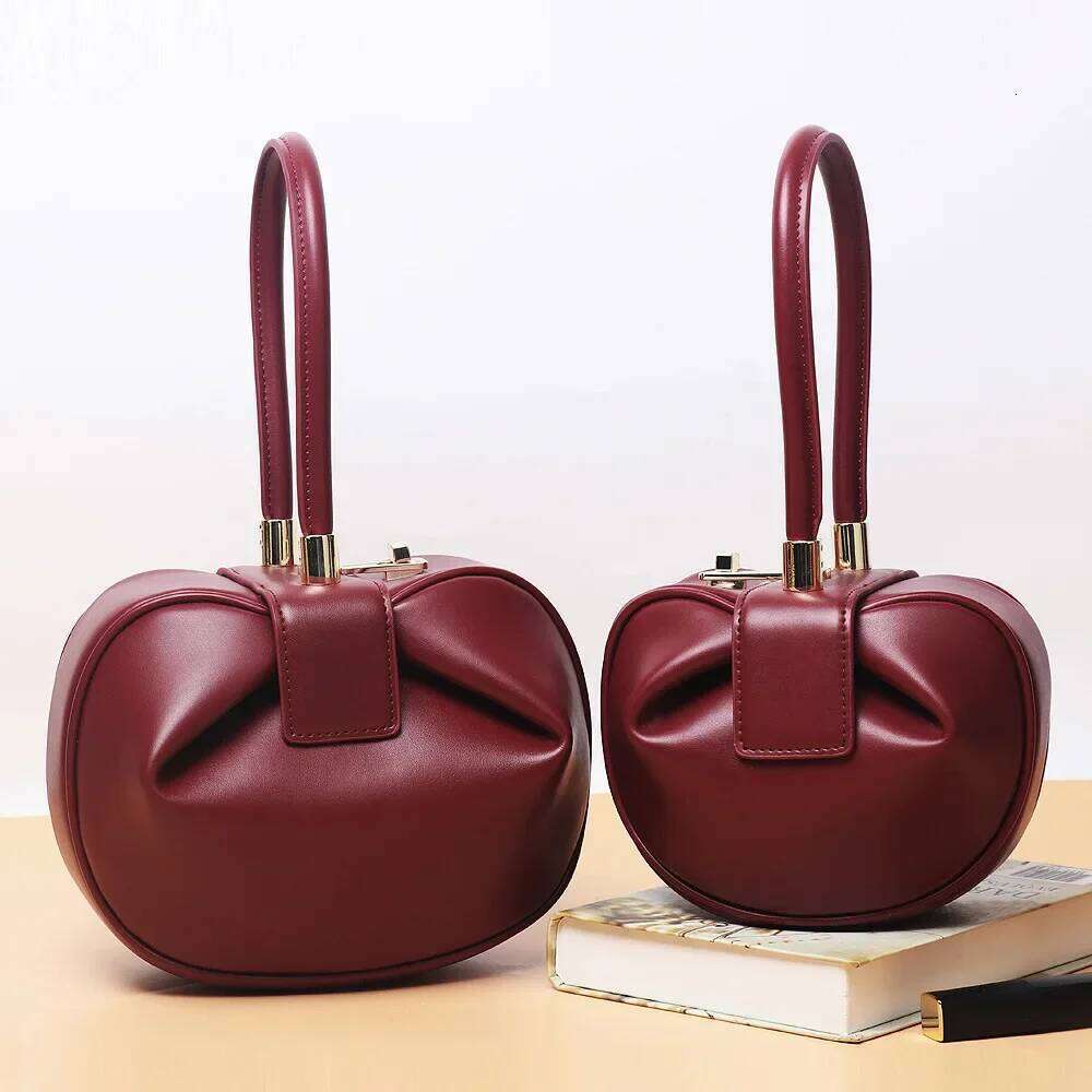 2022 New Women's Dumpling Shape Fashionable Cow Leather Handbag Wholesale Available Small Red Book Best Seller Clutch