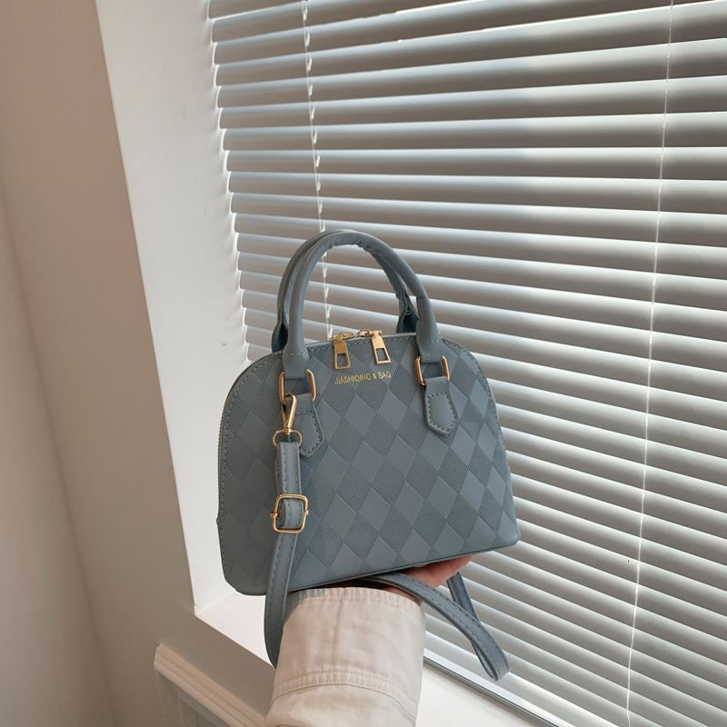 2025 Spring and Summer New Women's Bag New French Niche Design Texture Multi functional Women's Handbag New Elegant and Simple Women's 