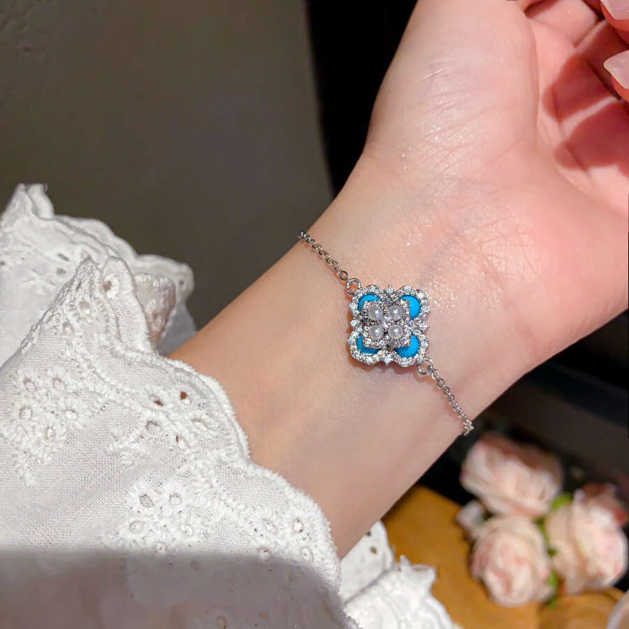 Luxury jewelry designer bracelet 4-leaf clover Zircon Turquoise Flower Pearl Open Palace Style Elegant Index Finger Ring Light High-end Sense Jewelry