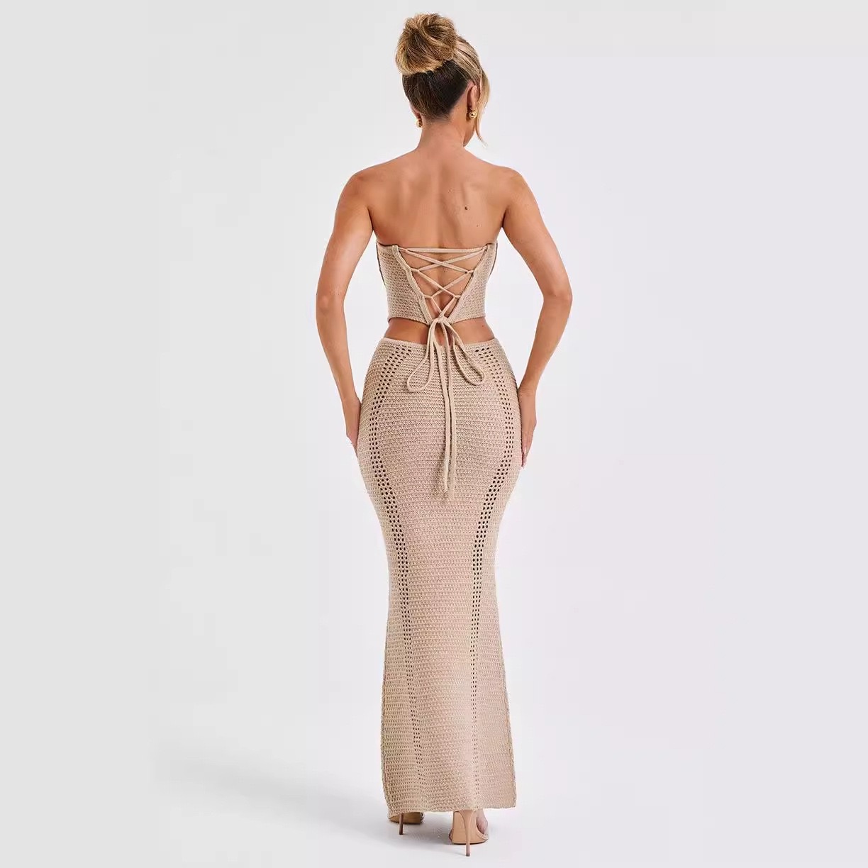 sexy and trendy backless, strapless top coat, hip-hugging long dress, and knitted set