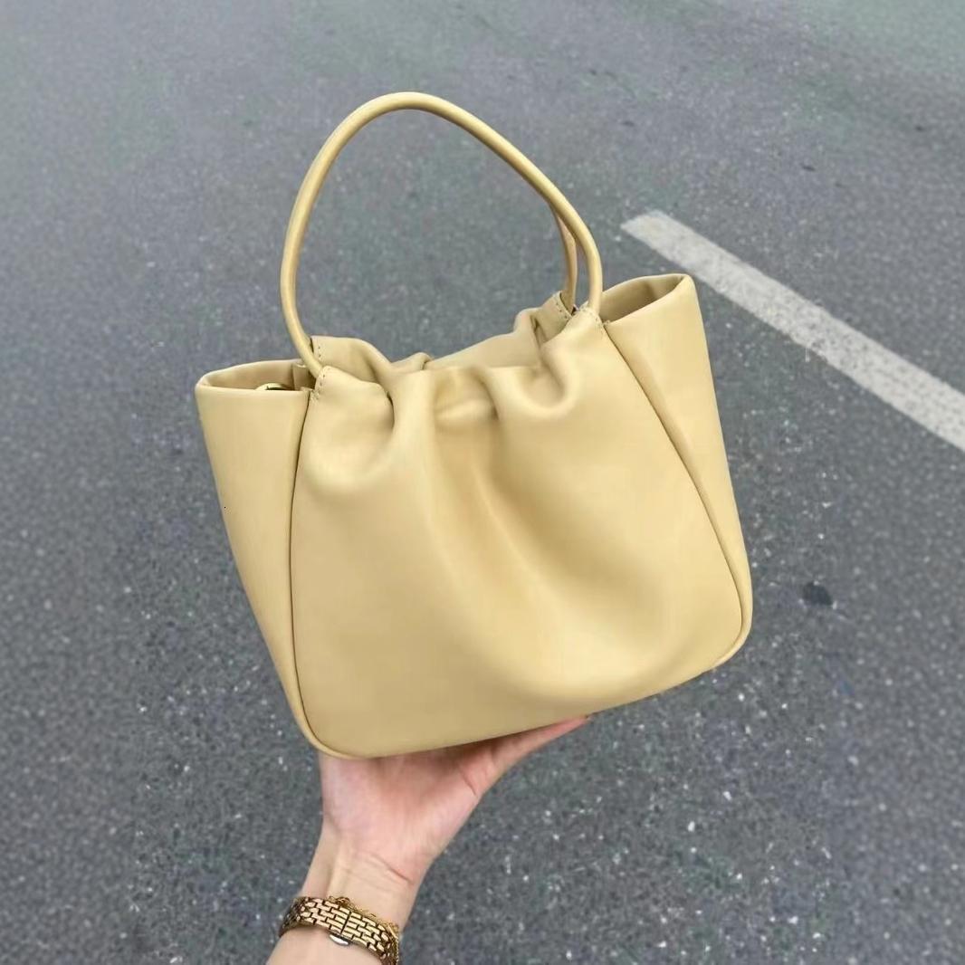Top High Quality New Style New Soft Leather Cloud Pleated Small Handbag Women's Tote Basket Niche High-end Commuter Crossbody Bag New Free Delive