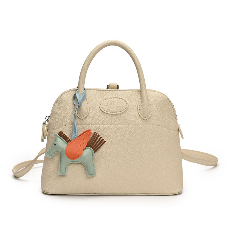 designer Niche Shell Commuter Backpack for Women 2025 New Simple Handheld Women's Bag Lightweight Ins Style Design Backpack