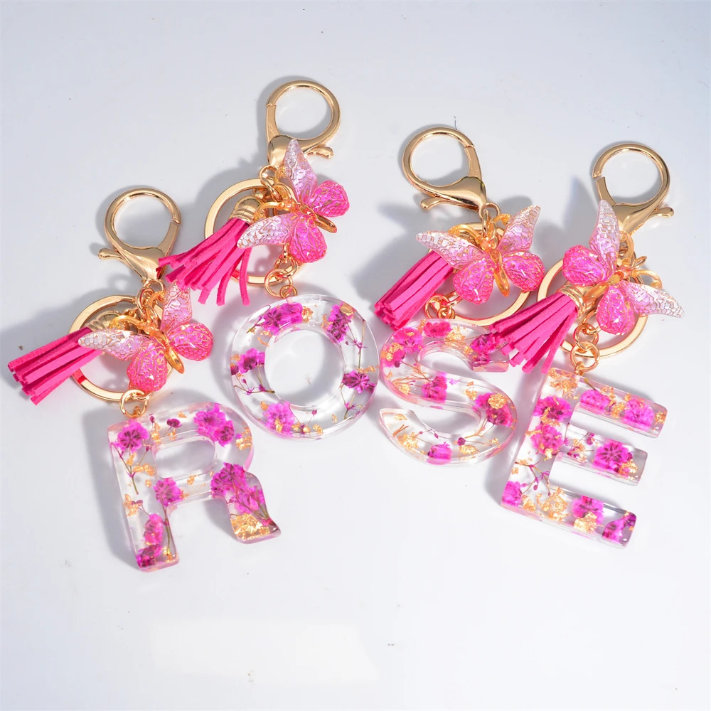 Exquisite Pink Dry Flower Resin 26 Initial Keychain Butterfly Tassel Pendant A to Z Keyring for Women Valentines Day Gift 250606