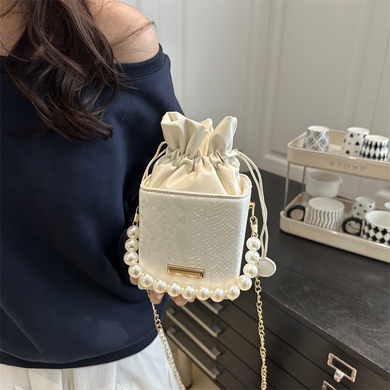 Top brand high-quality new free designer bag new fashion trend chain bag multifunctional fashion bucket bag pearl handbag unique shoulder bag new free