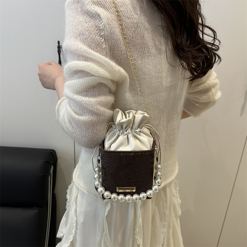 Top brand high-quality new free designer bag new fashion trend chain bag multifunctional fashion bucket bag pearl handbag unique shoulder bag new free