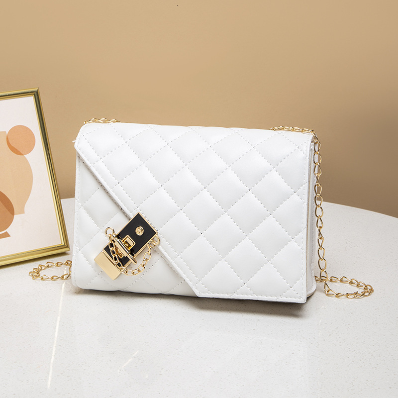 High quality brand new high-quality free designer bag new slanted shoulder missing corner small square bag fashionable quilted lock bag brand new free