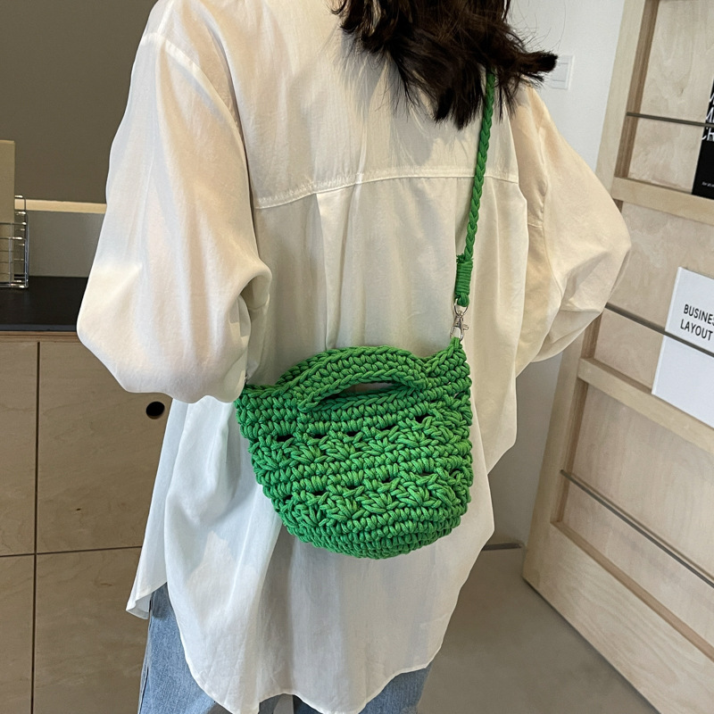 designer 2025 New Hollow Woven Bag for Women Versatile Crossbody Bag Vacation Beach Bag Niche Artistic Shoulder Crossbody Bag