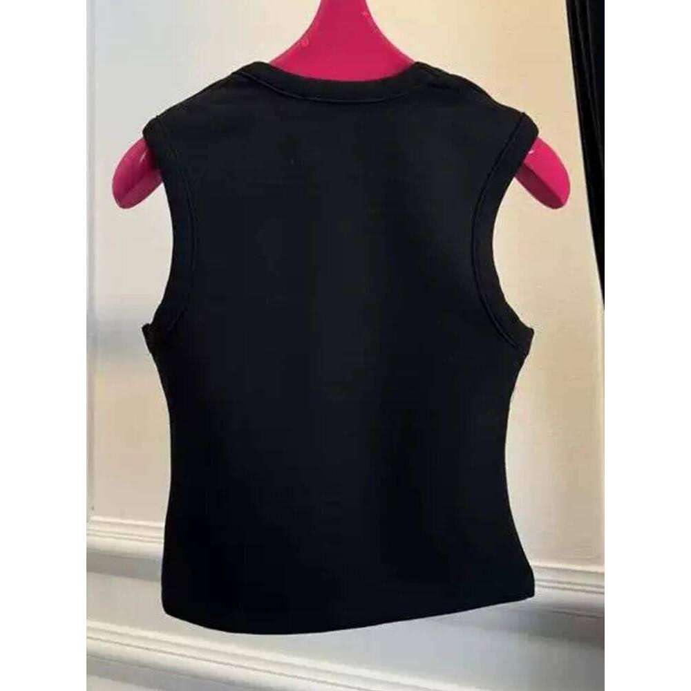 Heavy-duty rhinestones are fashionable versatile, they wear suspenders and vests inside. Summer women's new slim tops.