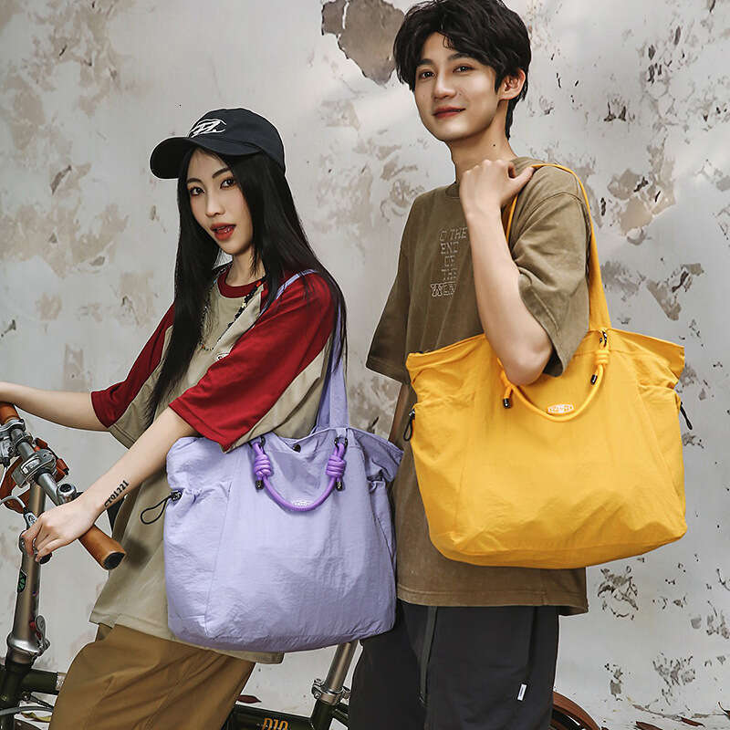 Tote 2025 New Unisex Large Capacity Lightweight Commuter Fashion Casual Versatile Shoulder Crossbody Bag